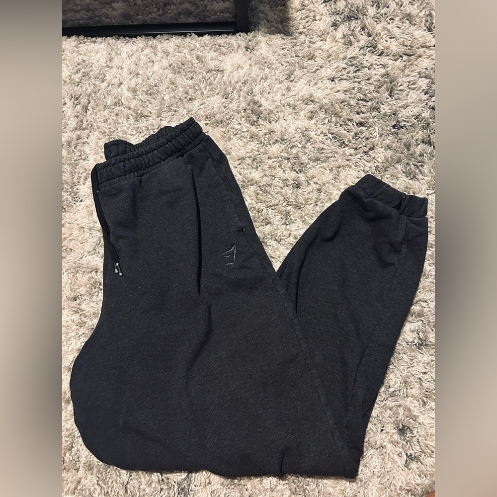 charcoal gymshark joggers 
size L